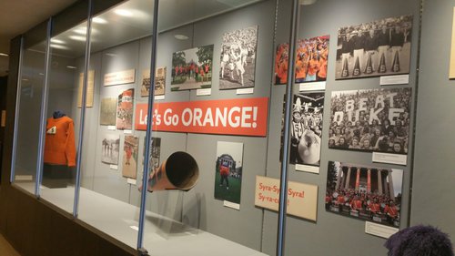 Exhibition case with materials from the University Archives&#x27; exhibit,  "150 Years of Tradition at Syracuse University"