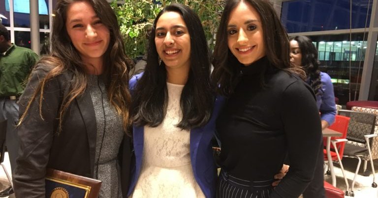 three women entrepreneurs pose for a group photo