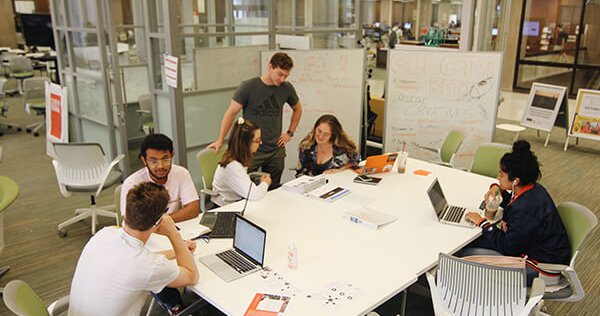 group of students working at table