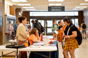 Welcome Fest attendees stop at information table, Fall 2023