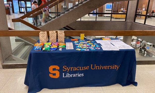 table with goodies for handout at Bird Library