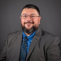 headshot of  Winn Wasson