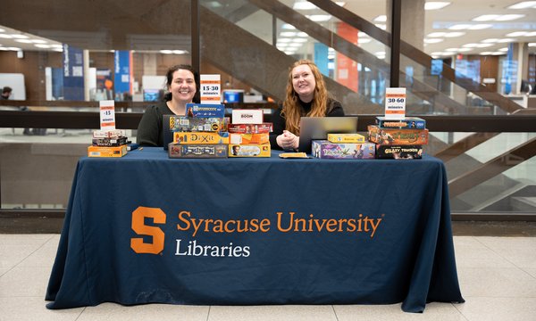 two people sitting at Libraries table