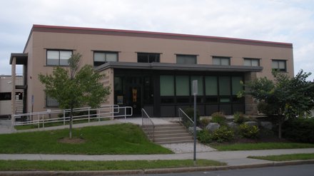 two story beige concrete building