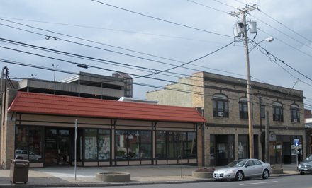 several storefronts with glass windows