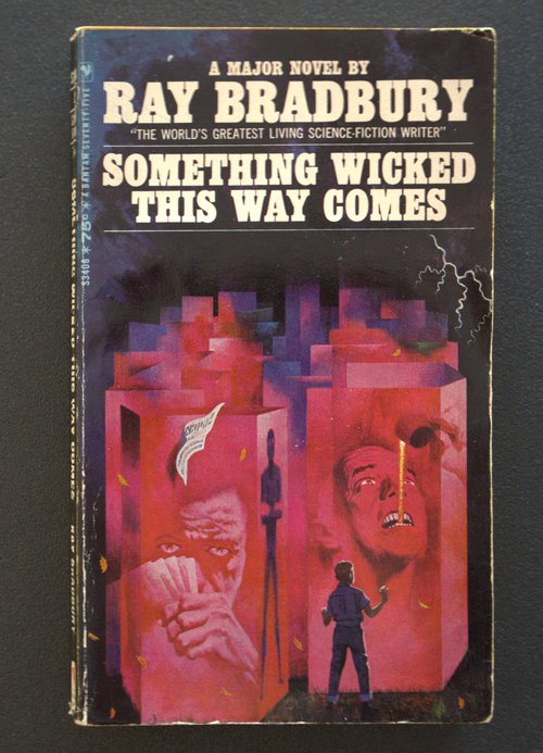 Cover of Ray Bradbury&#x27;s Something Wicked This Way Comes with red illustrations of people in geometric shapes