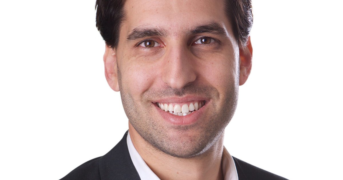 man in a dark suit jacket