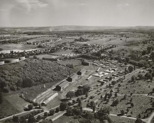Aerial view of South Campus with temporary housing, September 21, 1955. Syracuse University Photograph Collection.