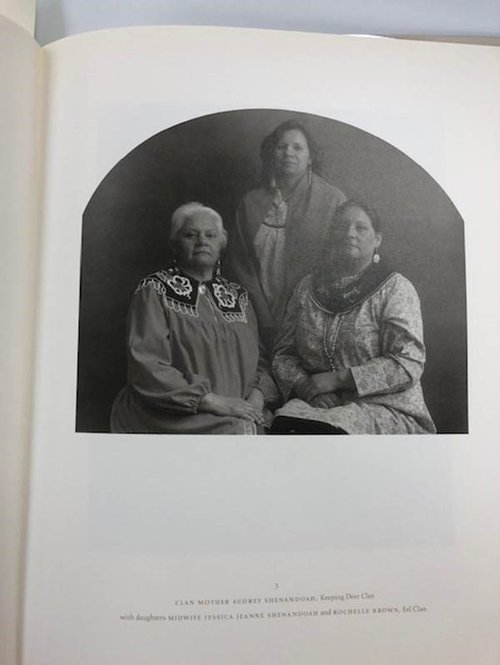 An image of Clan Mother Audrey Shenandoah, Keeping Deer Clan with daughters Midwife Jessica Jeanne Shenandoah and Rochelle Brown, Eel Clan, in Toba Pato Tucker’s book Haudenosaunee- portraits of the firekeepers, the Onondaga Nation. Rare books.