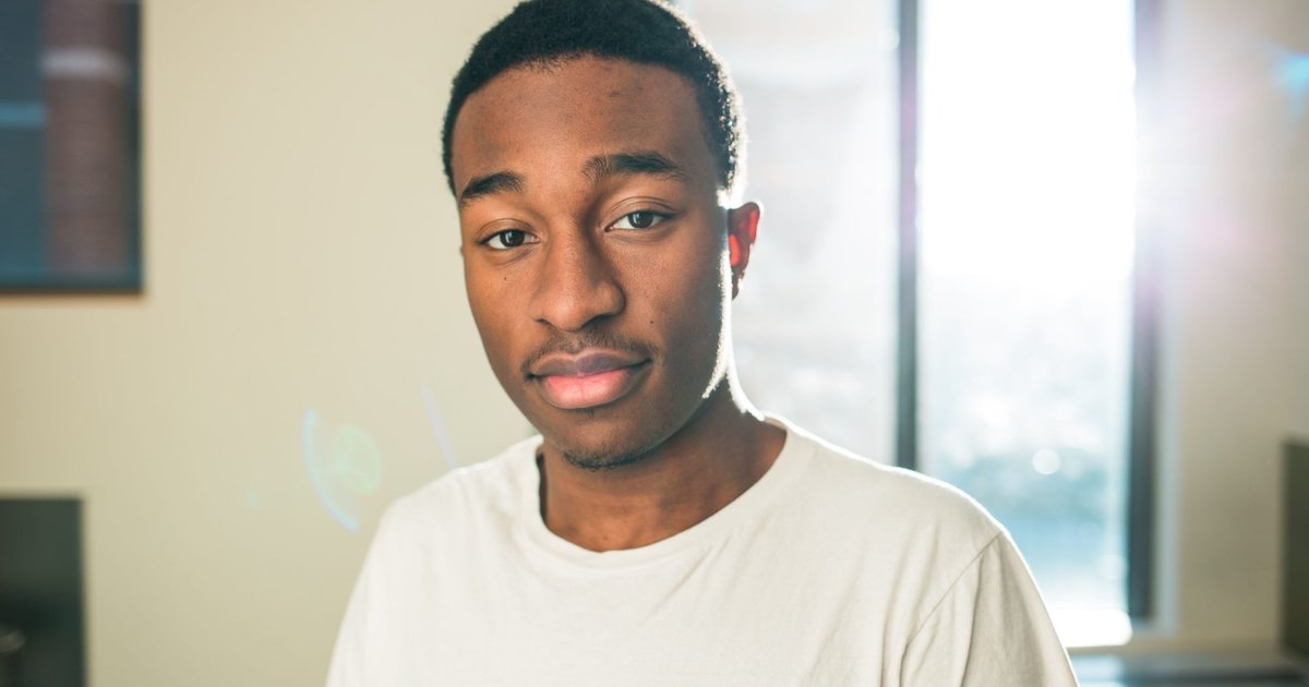 Anthony Obas in white t-shirt