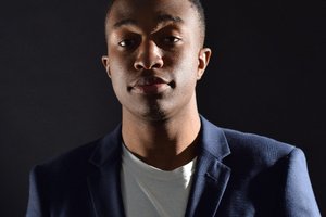 Anthony Obas poses for a photo