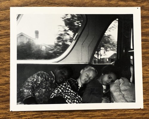 As part of an education initiative, Crusade for Opportunity regularly offered field trips for children in Syracuse neighborhoods. Here are four children sleeping on a bus after a CFO field trip to a local farm.