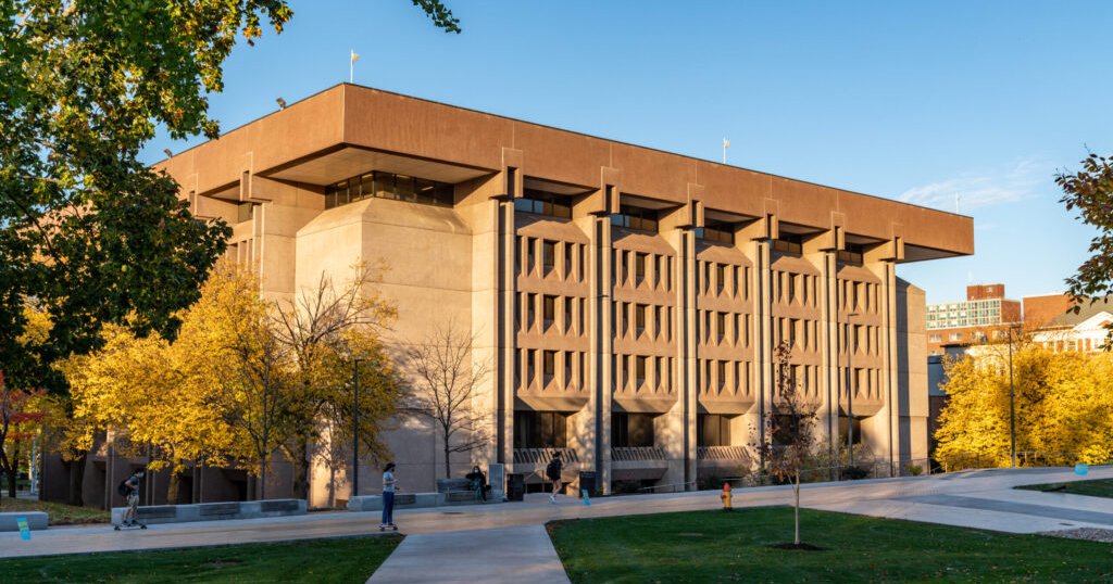 Bird Library at sunset with yellow fall trees