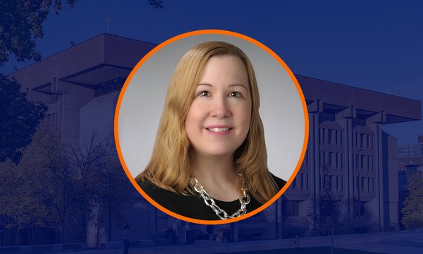 head and shoulders photo of Brenna Helmstutler in circle with blue background