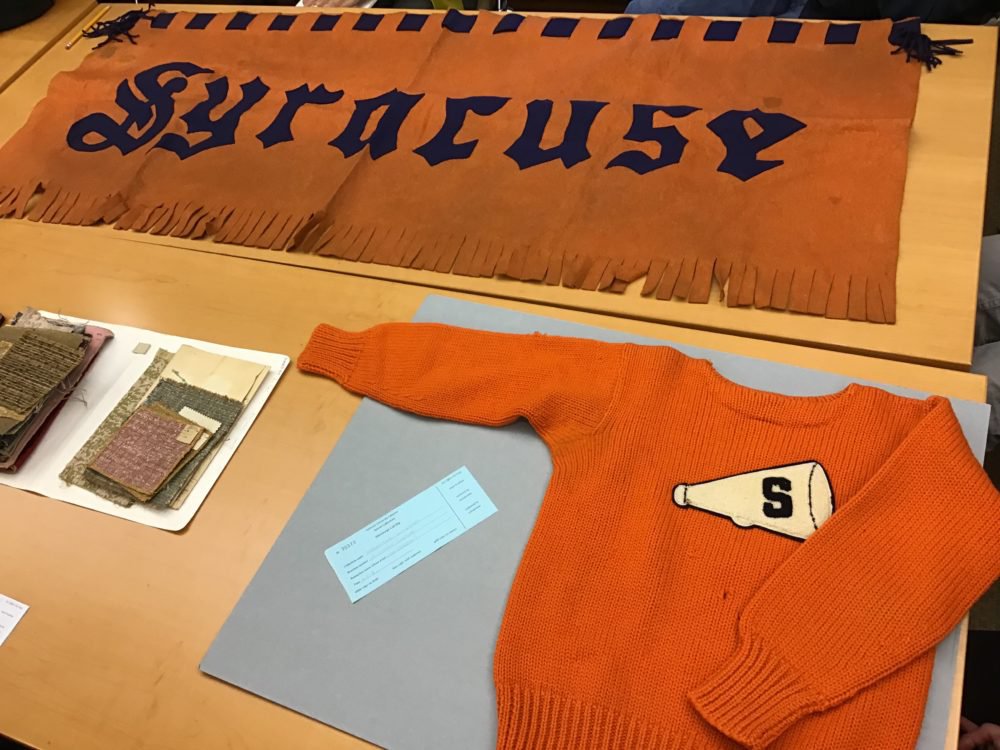 Textiles from our University Archives collections used during the workshop included a Syracuse University banner made out of felt and a cheerleader’s sweater, likely dating to the 1950s