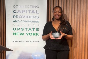 Celes Buffard, founder of SecondWave, with first place trophy.