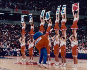 Cheerleaders and Otto on the basketball court in 2000. Courtesy of Syracuse University Archives
