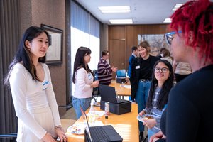 Students presenting research at SOURCE Explore 2024.