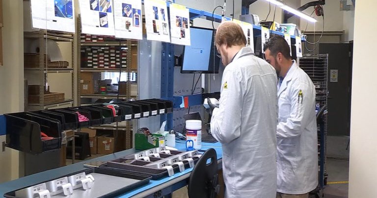 two people in technology lab