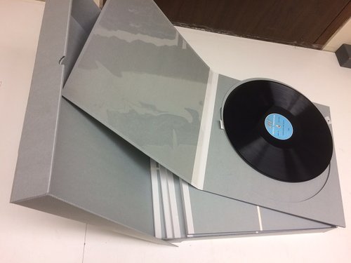 gray box sleeves with LP record inside box