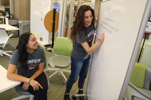 Elizabeth Tarangelo and Kayla Simon practicing their pitch in the LaunchPad