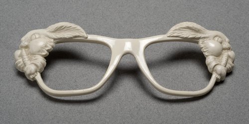 Foster Grant & Co. white sunglasses with a bunny motif. Plastics Artifacts Collection.
