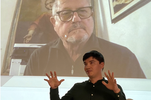 Gianfranco Zaccai ’70 H’09 (pictured on screen), donor for Intelligence ++, and  Kai  Patricio G’23 (College of Visual and Performing Arts) cohosting a workshop.