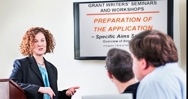 group of people at a grant workshop