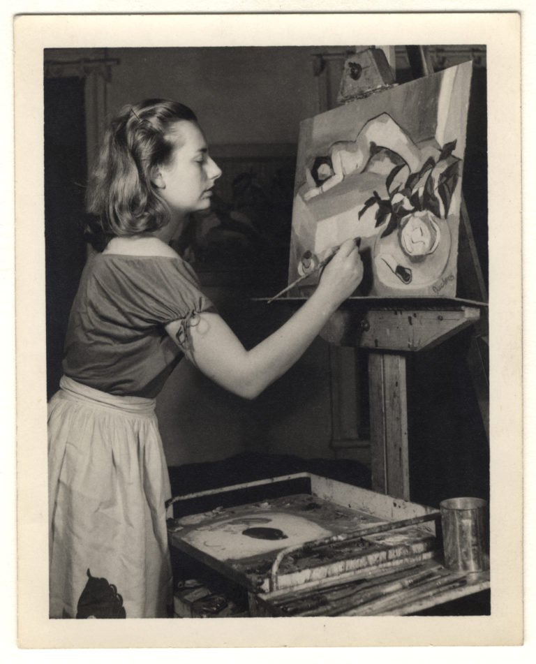 Grace Hartigan painting in her studio in 1940s