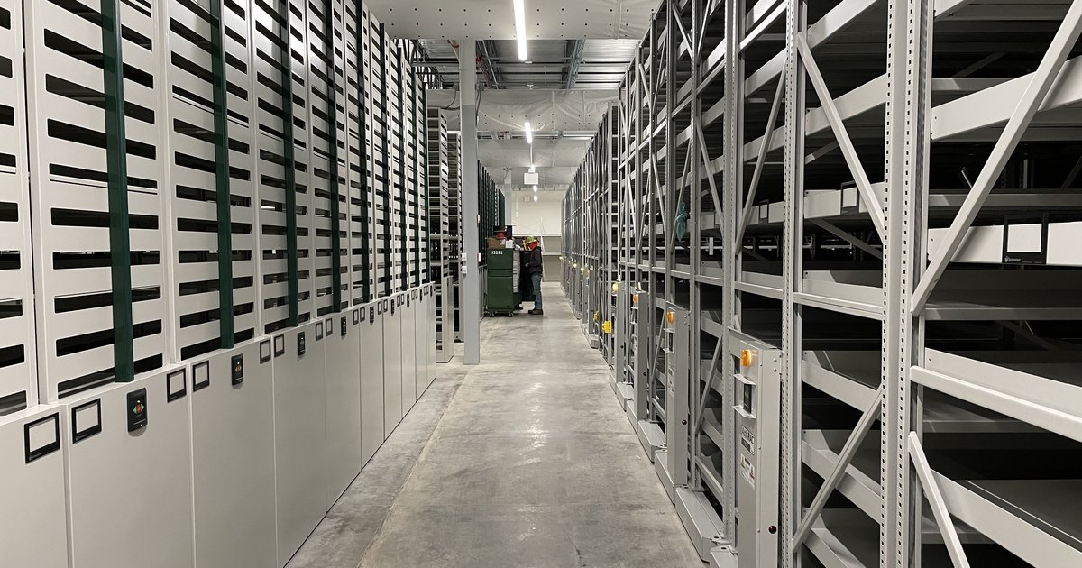 Module 2 Storage Facility with long row of silver metal shelving