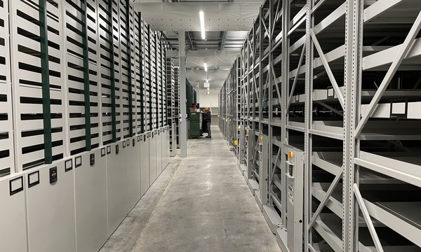 Module 2 Storage Facility with long row of silver metal shelving