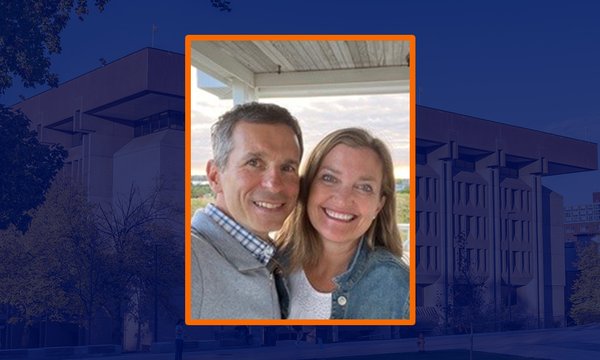 couple in center box, blue sepia of bird library in background