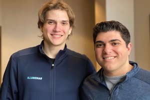 two young men wearing jackets with Illumenar name
