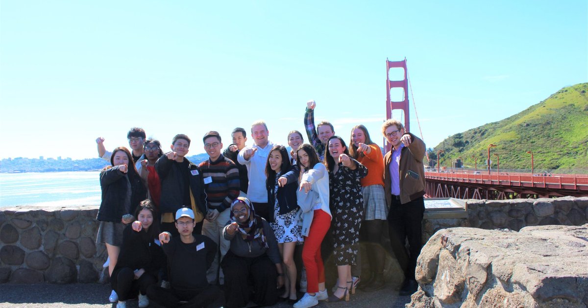 Immersion trip group photo in front of Golden Gate bridge