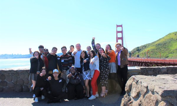 Immersion trip group photo in front of Golden Gate bridge