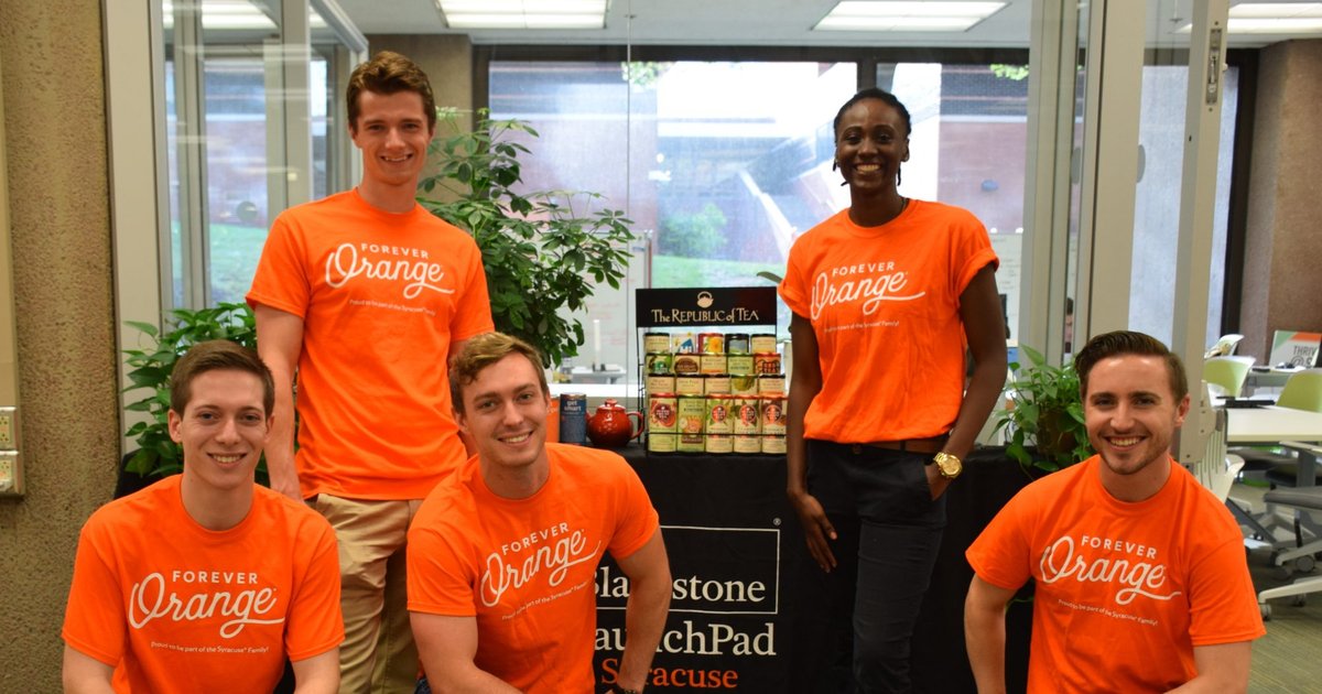 Innovation Mentors pose for a photo in front of LaunchPad