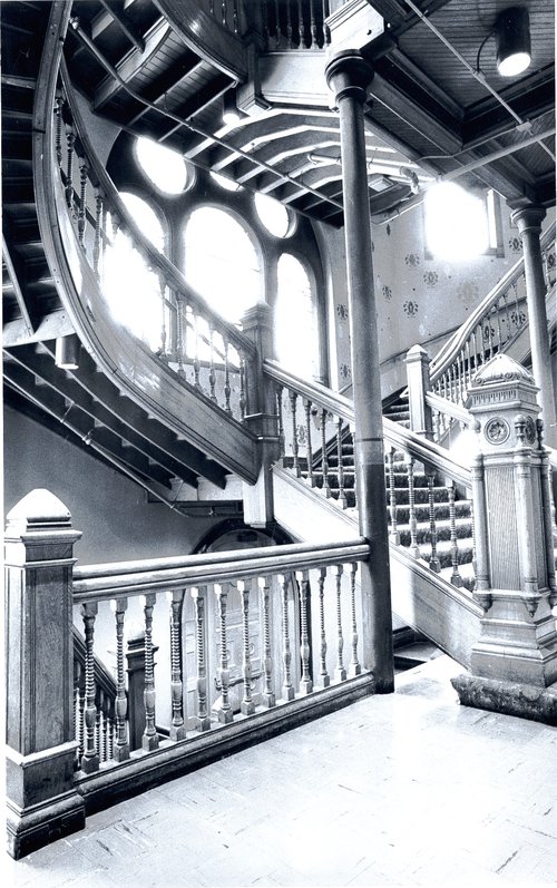 Interior view of the grand stairway in Crouse College, c. 1960. Syracuse University Photograph Collection.