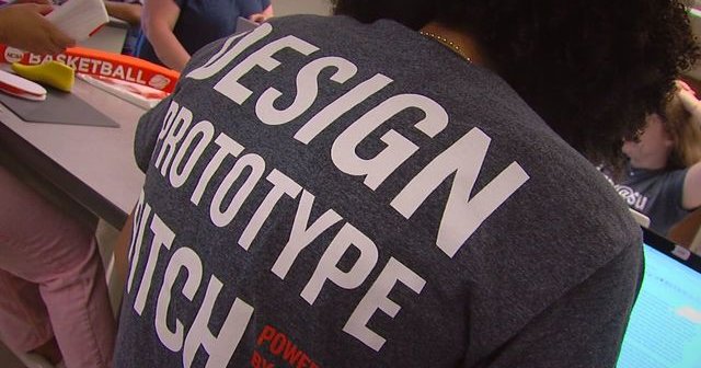 student in Invent@SU t-shirt