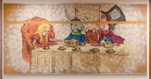 Jabberwocky mural with imagery of Alice in Wonderland, rabbit, tea party