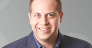 Jared Sorin smiles for a photo