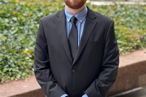 Josh Alter poses for a photo