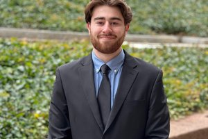 Josh Alter poses for a photo