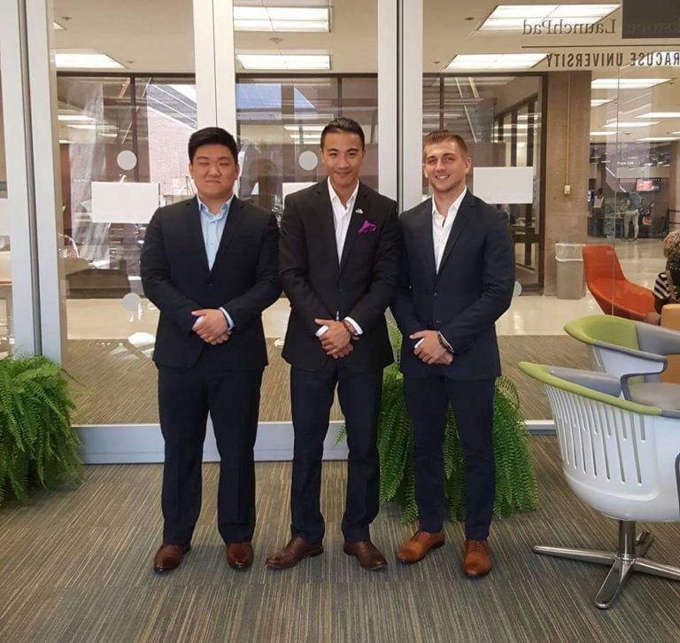 three men in suit