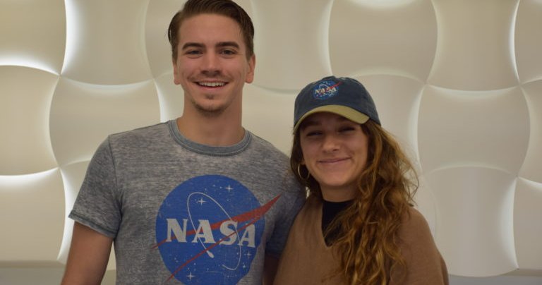 Kayla Simon and Charles Keppler pose for a photo