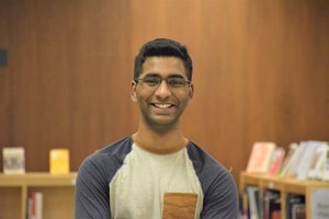 student in library