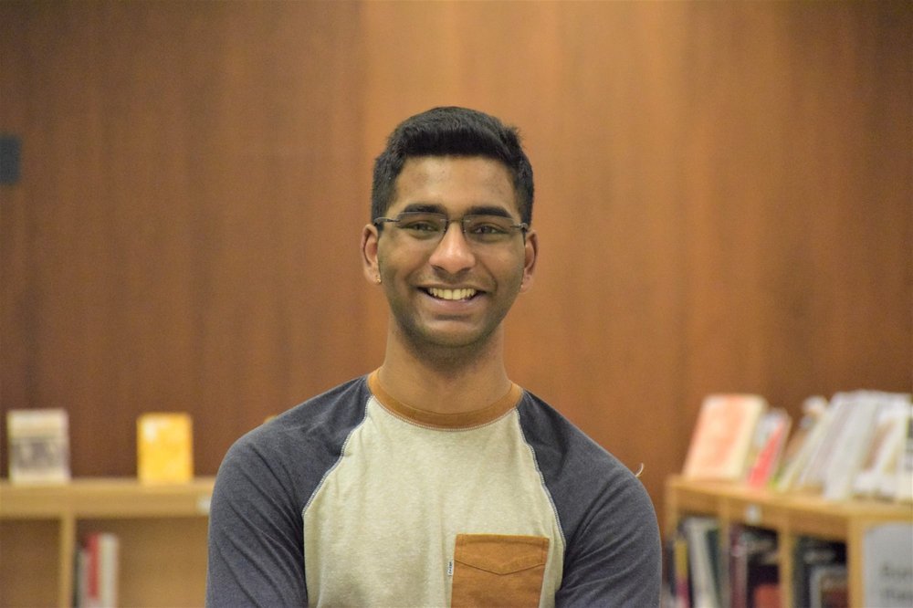 student in library