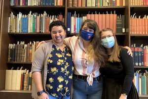 L-R: Aisha, Nora, and Tiffany in the archives