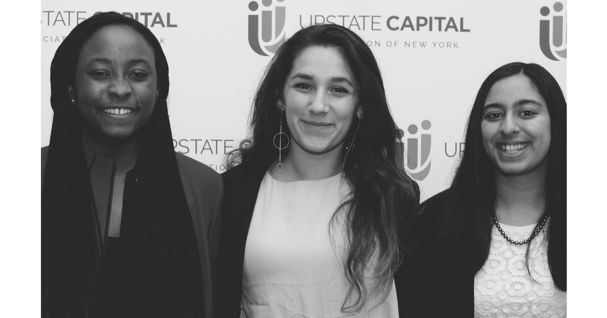 three female LaunchPad students at NYBPC Competition