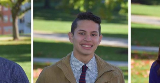 picture of two male and one female students