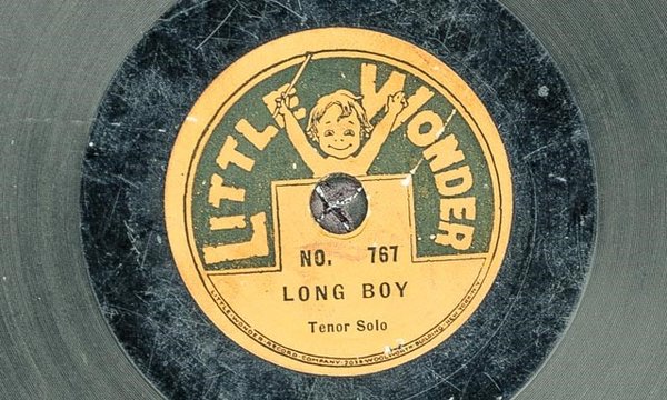 Black record with a yellow and green center